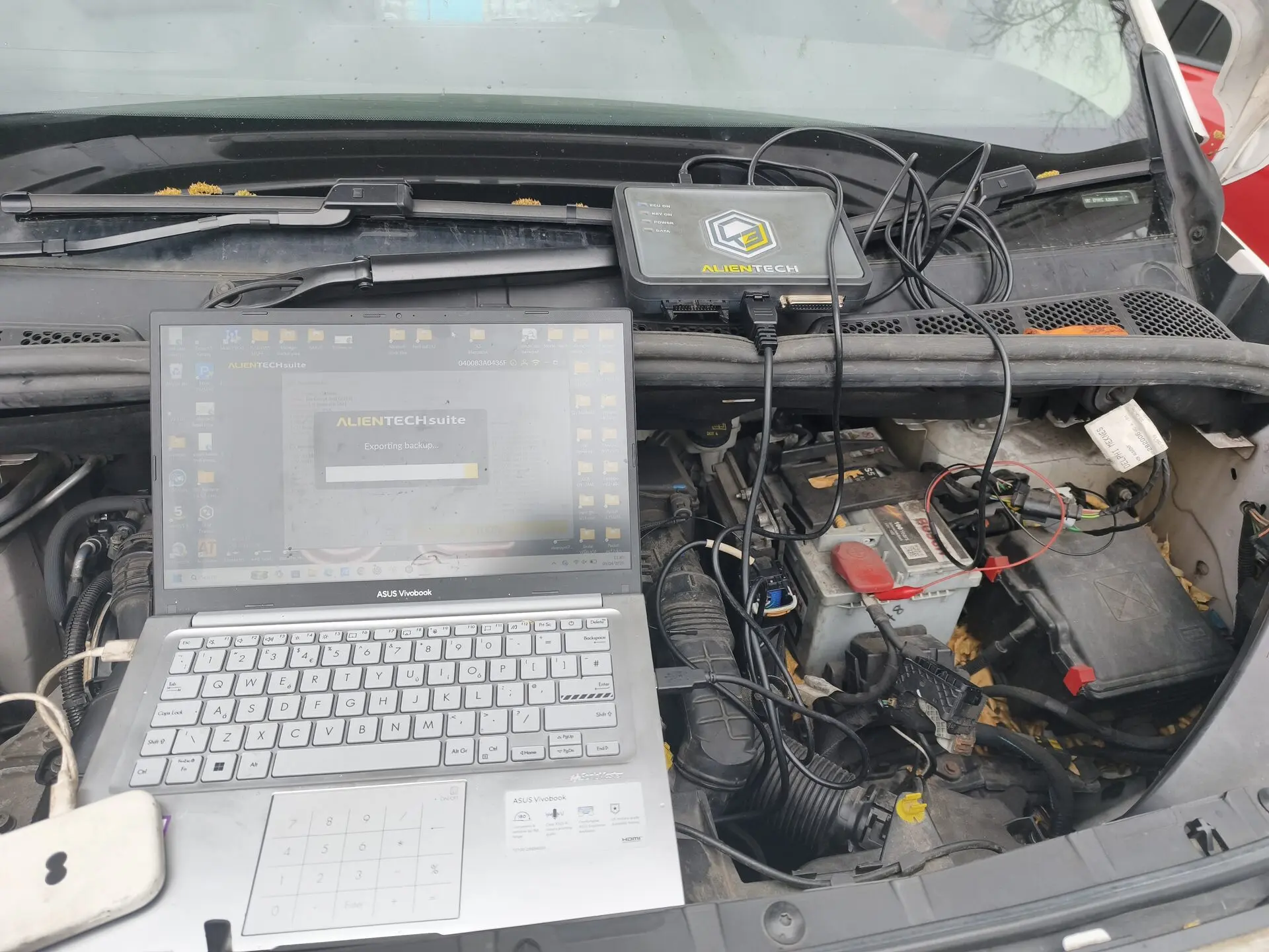 Alientech diagnostic tool connected to a vehicle at Panache Tuning